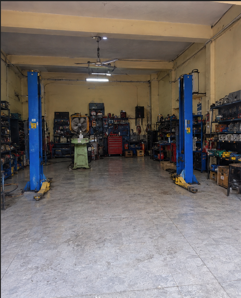 Dawn Automobile workshop interior with mechanics at work